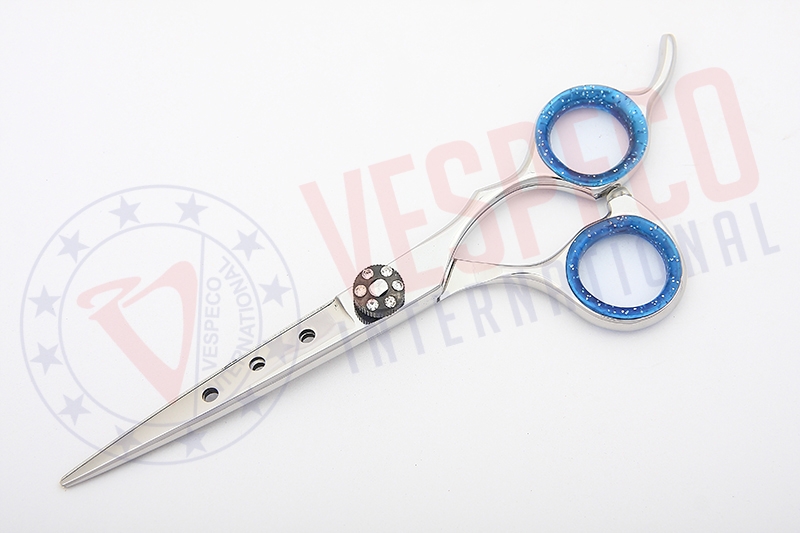 Scissors with holes